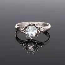 Nopos foglalgalatú ezüst gyűrű - Kék Topáz