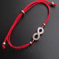 Állítható piros szalag, cirkónia köves végtelen jellel