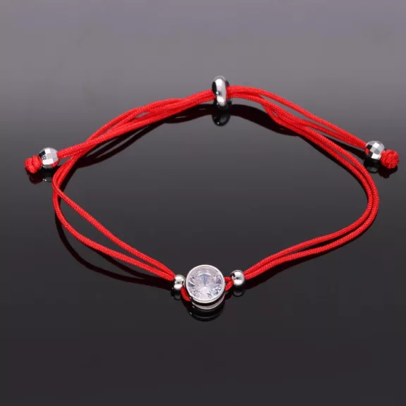 Húzózáras piros szalag karkötő, Hópehely medállal