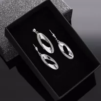 Csavart ovál medál és fülbevaló szett