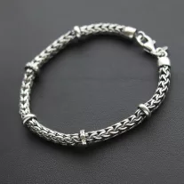 Szakaszos-Fonott Ezüst karkötő