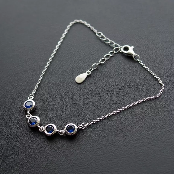 4 Kék Cirkónia Butonos ezüst karkötő